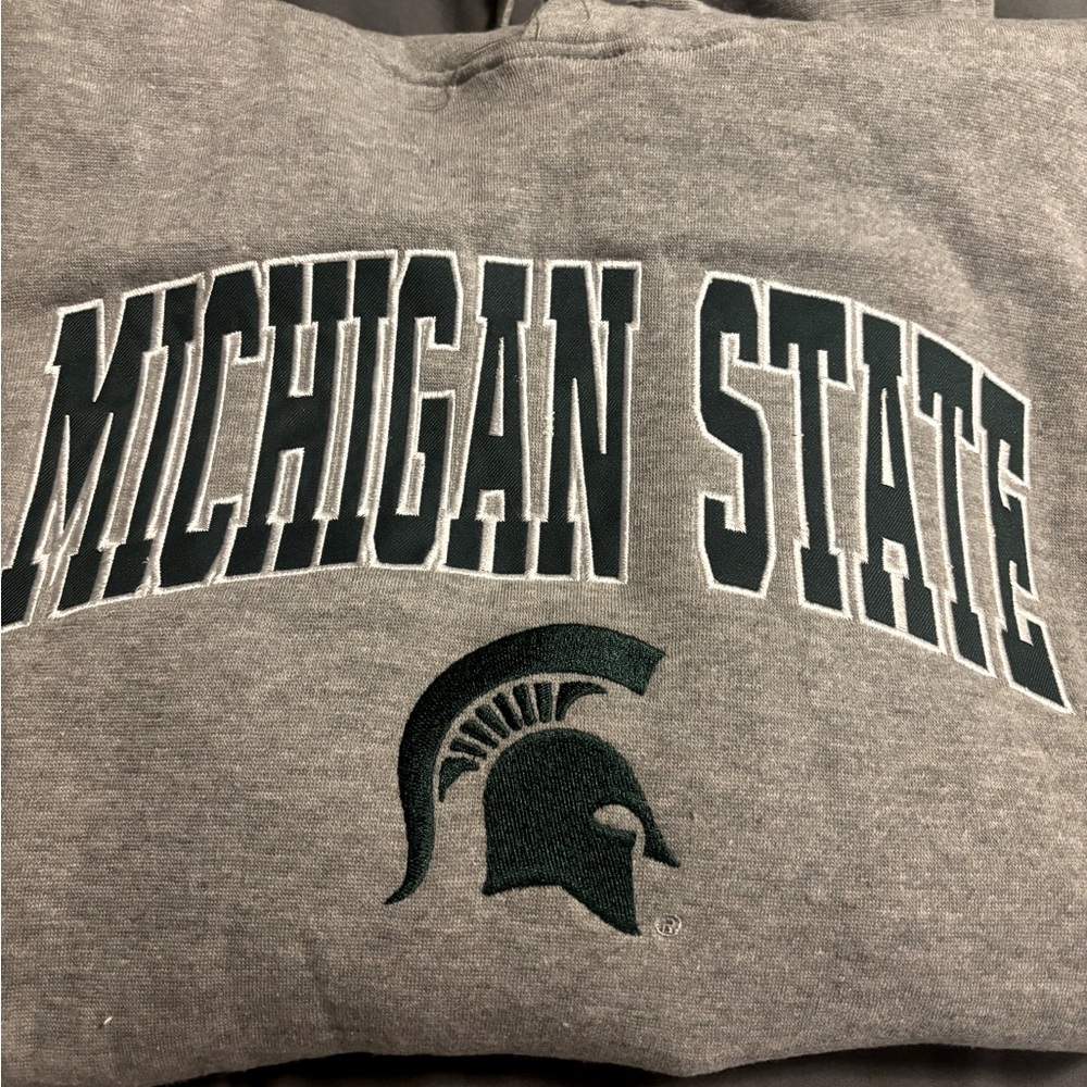Michigan state sweater
Great sweater was too small for him
